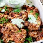 Mediterranean Grilled Chicken + Dill Greek Yogurt Sauce. Top grill recipe! Marinate boneless chicken thighs in Mediterranean spices, olive oil and lemon juice. Grill for less than 15 minutes, and serve with this flavor-packed dill yogurt sauce! Pin it to try soon!