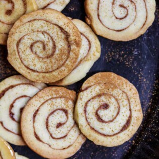 Honey Bun Cinnamon Cookies | The Mediterranean Dish. Extremely moist, buttery, cinnamon cookies topped with a delicious honey icing. Easy recipe with step-by-step tutorial. Perfect holiday cookies or every-day cookies! See it on TheMediterraneanDish.com