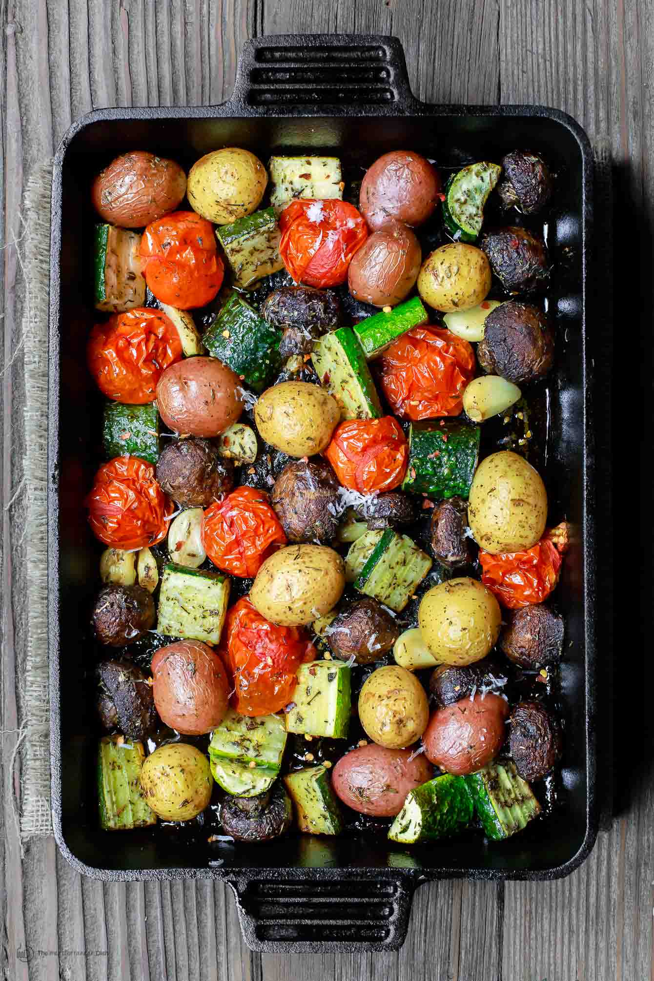 Oven Roasted Vegetables including zucchini, tomatoes, potatoes and mushrooms
