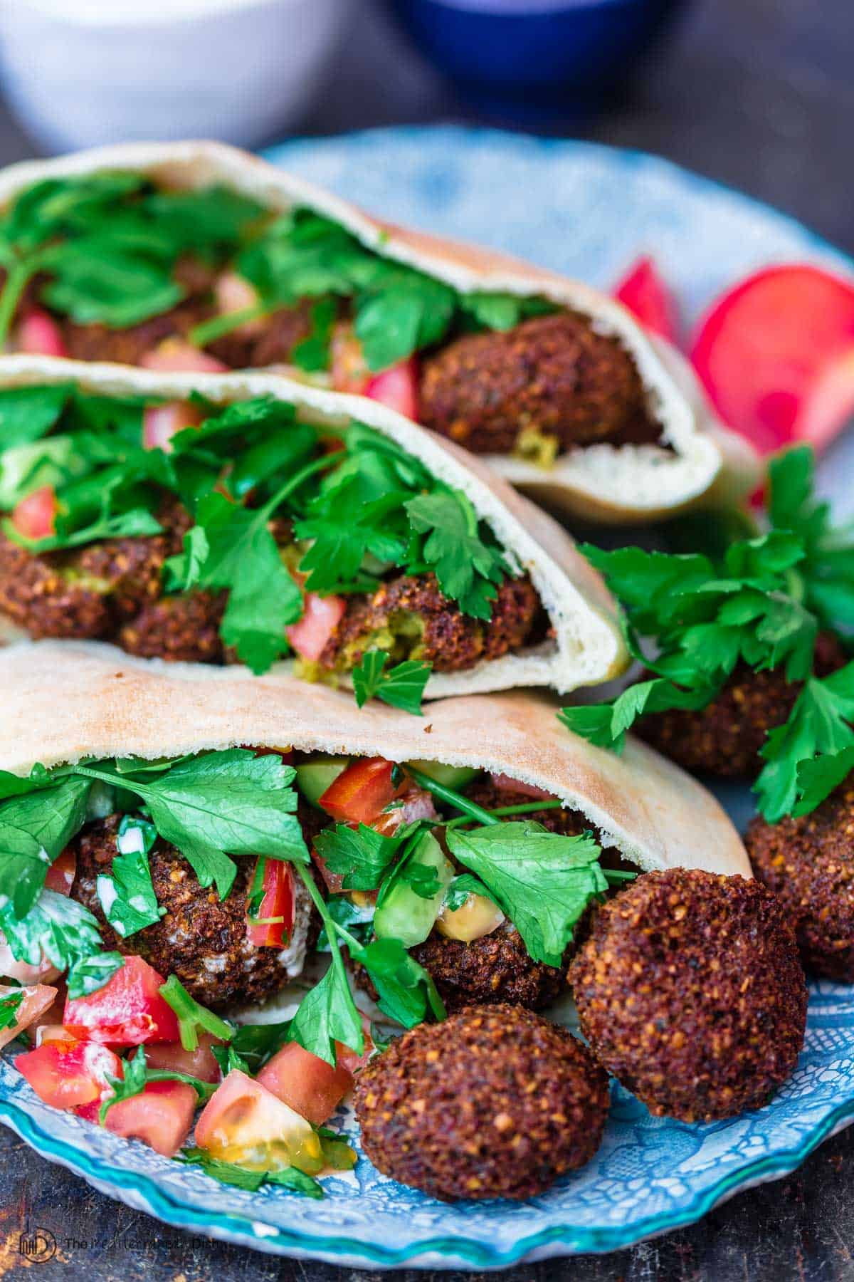 Falafel in pit pockets with garden vegetabiles and tahini