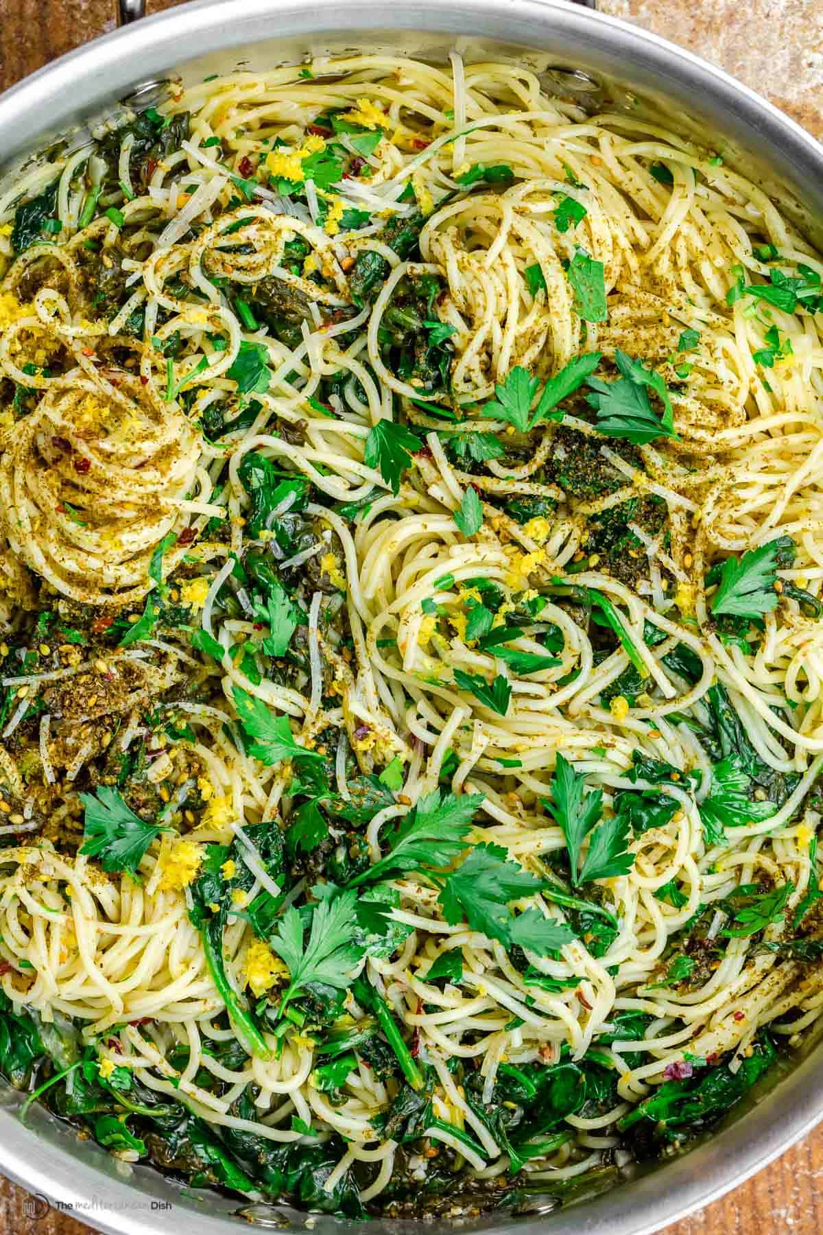 Close-up of garlic pasta with spinach