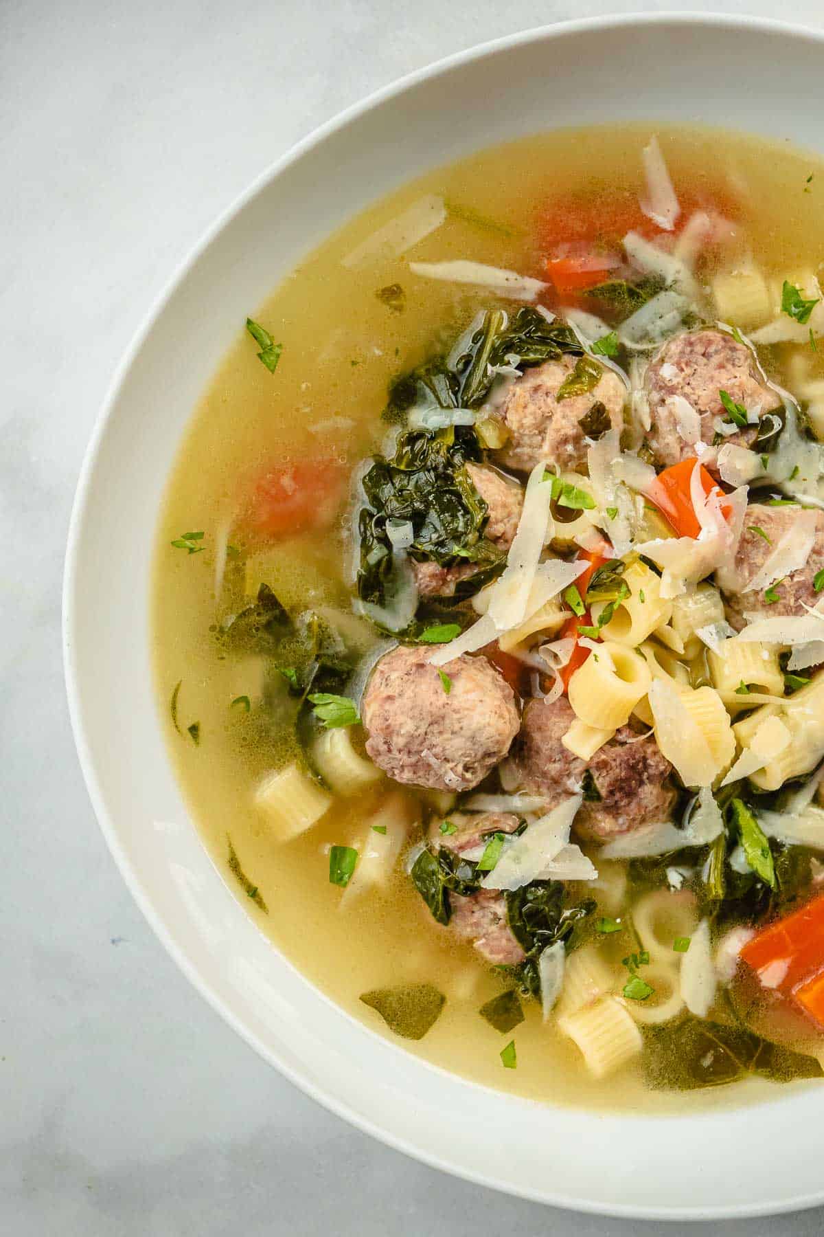 close up of a bowl of italian wedding soup.