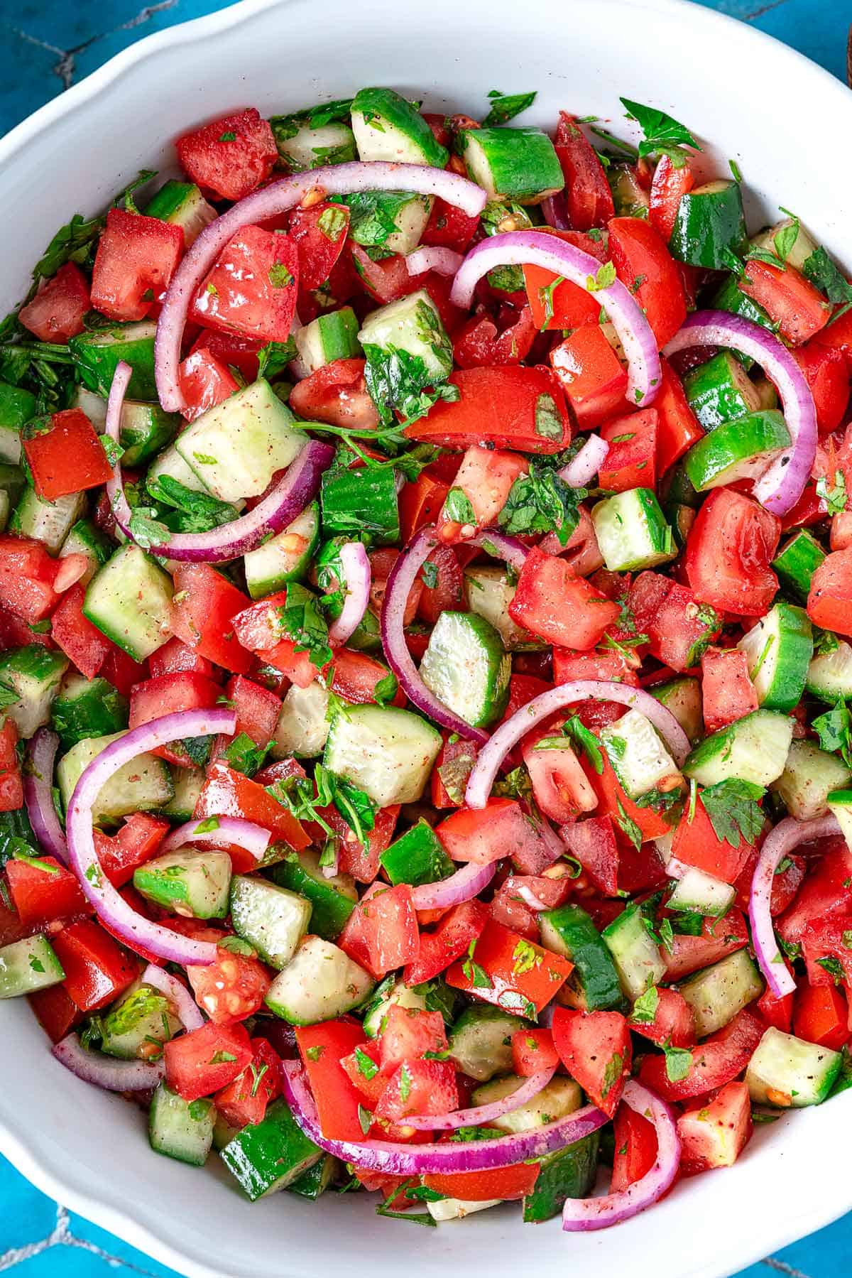 cucumber tomato salad in a bowl.