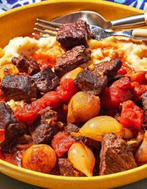 stifado greek beef stew web story poster image.