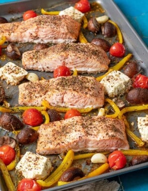 baked salmon with vegetables and feta web story poster image.