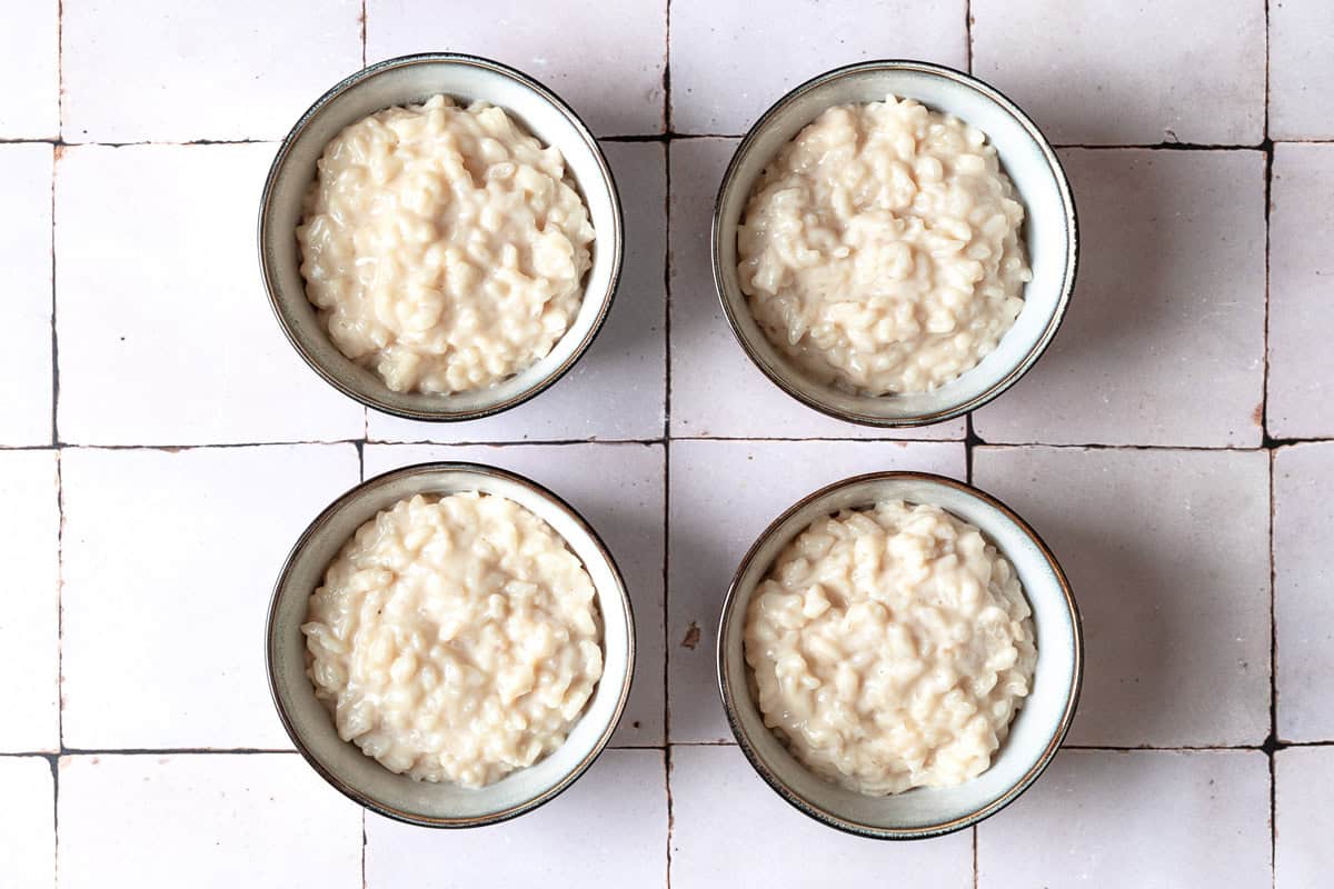 An overhead photo of 4 bowls of easy rice pudding.