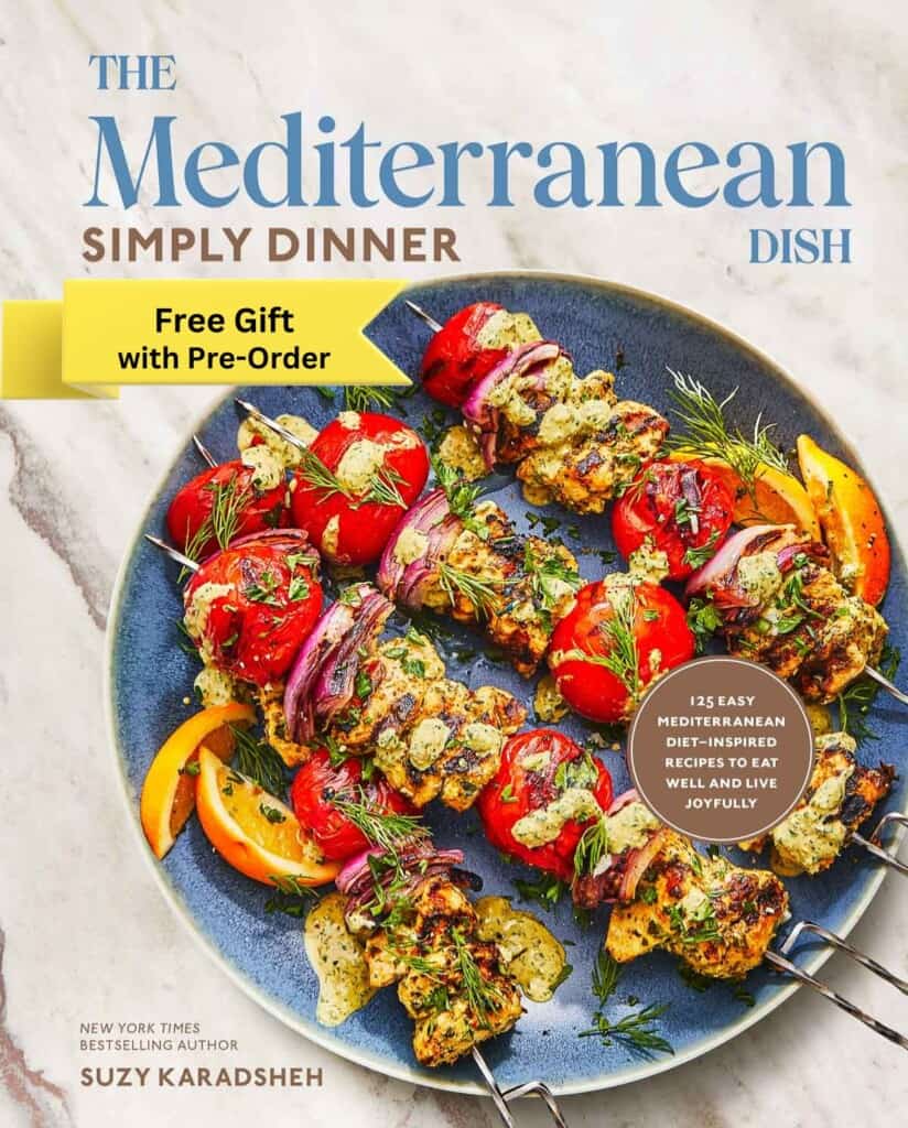 Cover of The Mediterranean Dish: Simply Dinner Cookbook with a banner advertising free gift with pre-order