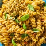 A close up of pesto alla trapanese pasta in a bowl.