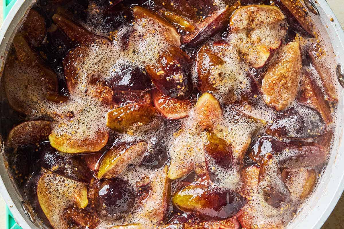 Figs simmering in a pot.