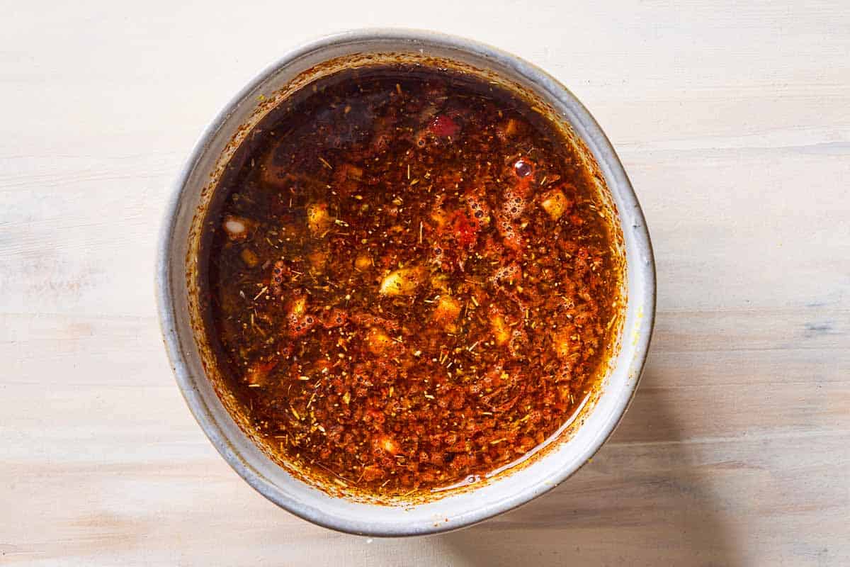 An overhead photo of lemon garlic sauce in a bowl.