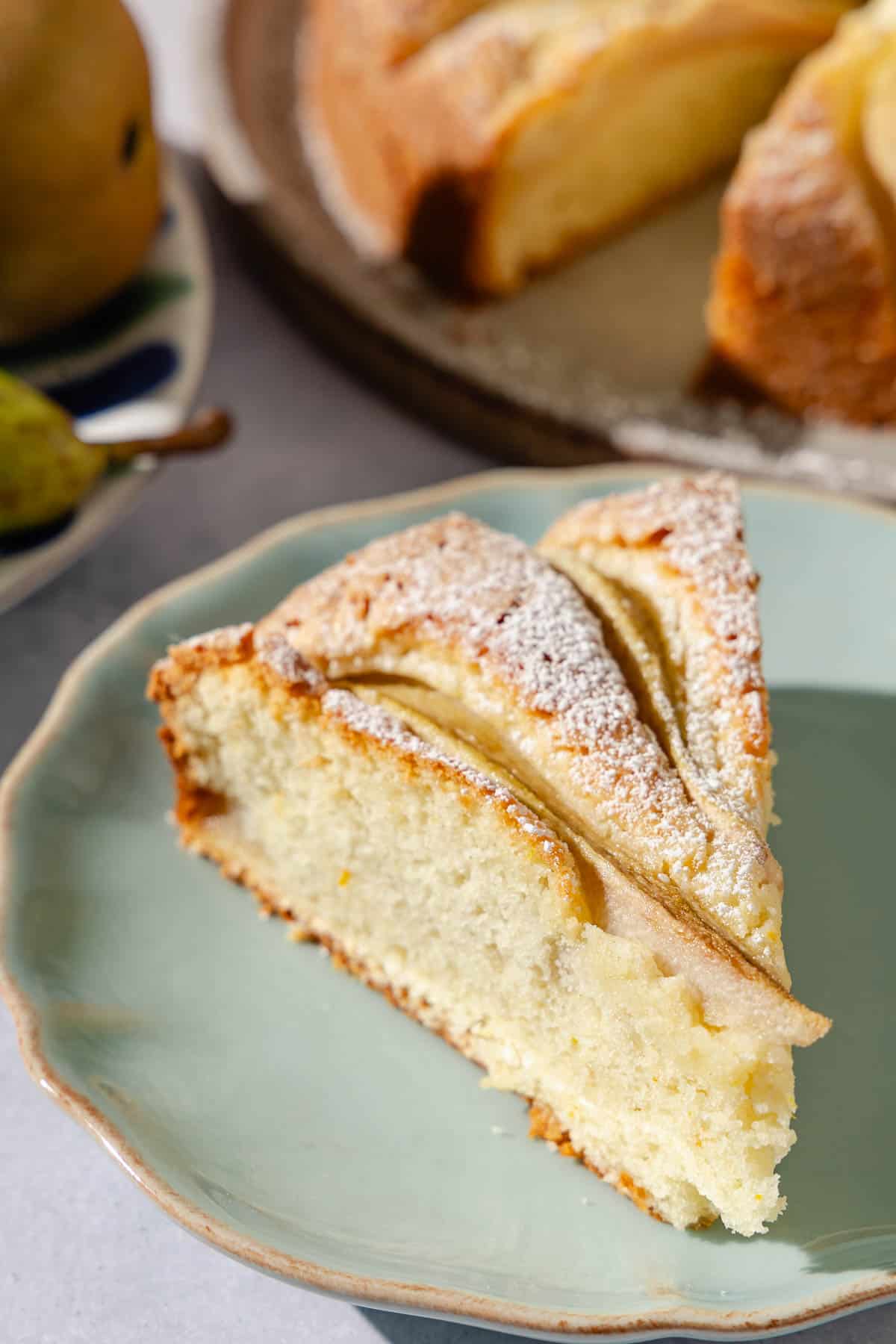 a slice of Italian pear cake on a plate.