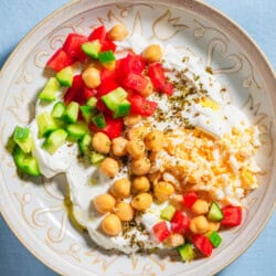 An overhead close up photo of a savory yogurt bowl.