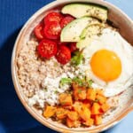 An overhead photo of a savory oatmeal bowl.