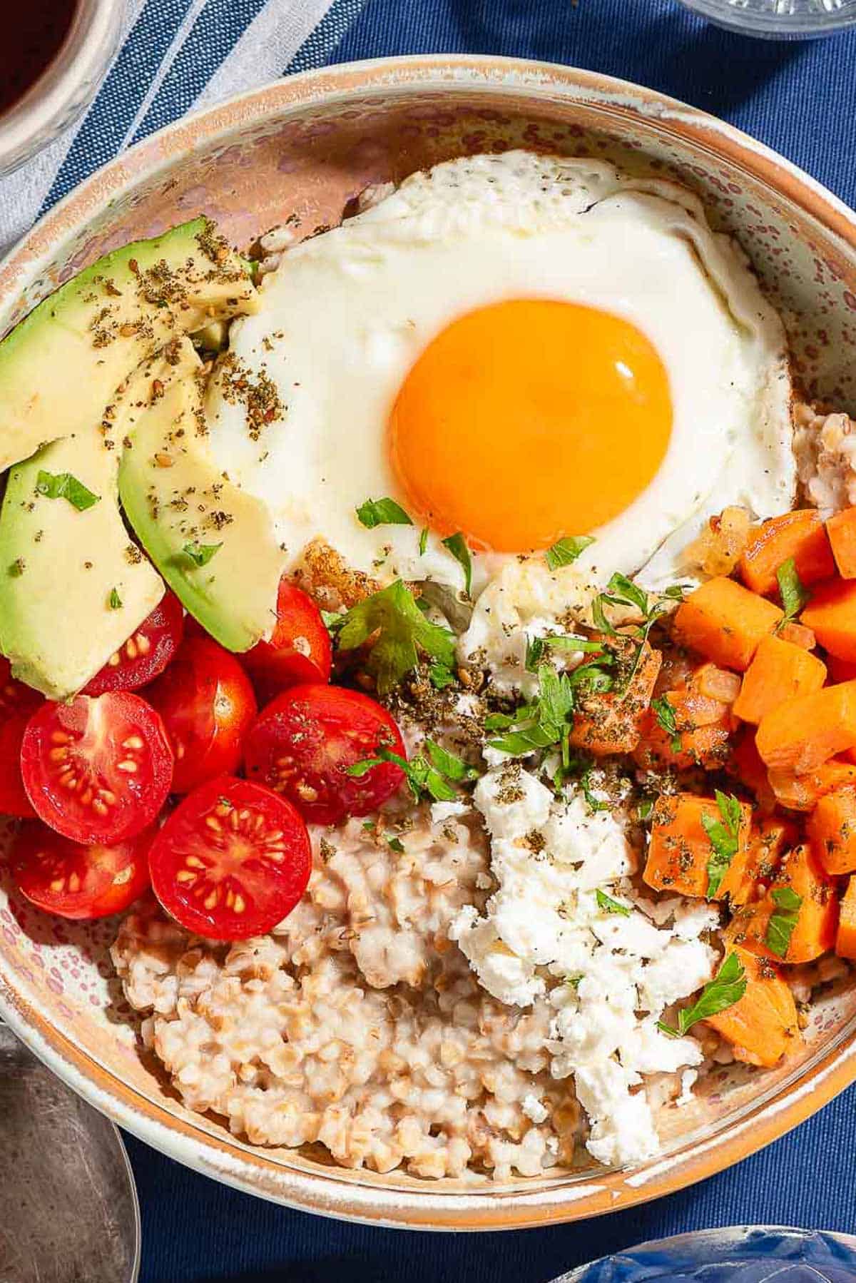 A close up of a savory oatmeal bowl.