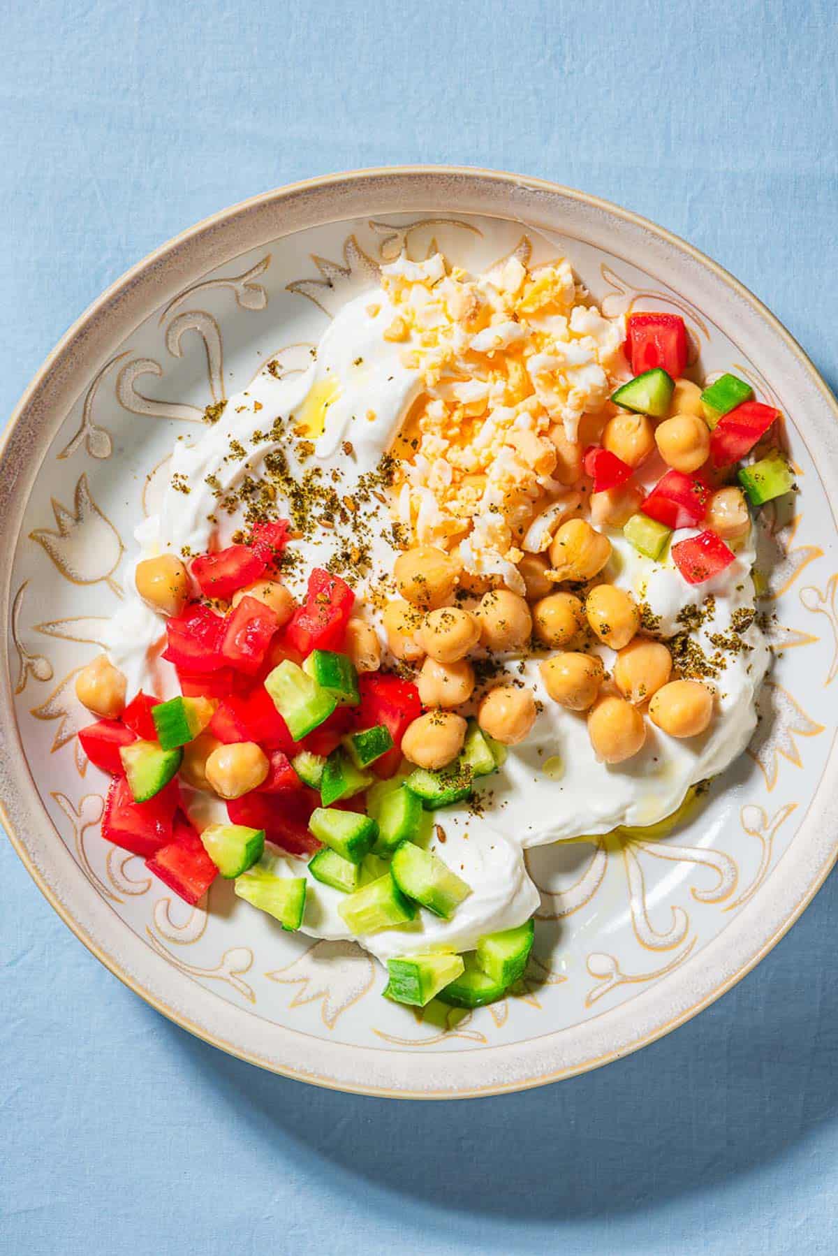 An overhead photo of a savory yogurt bowl.