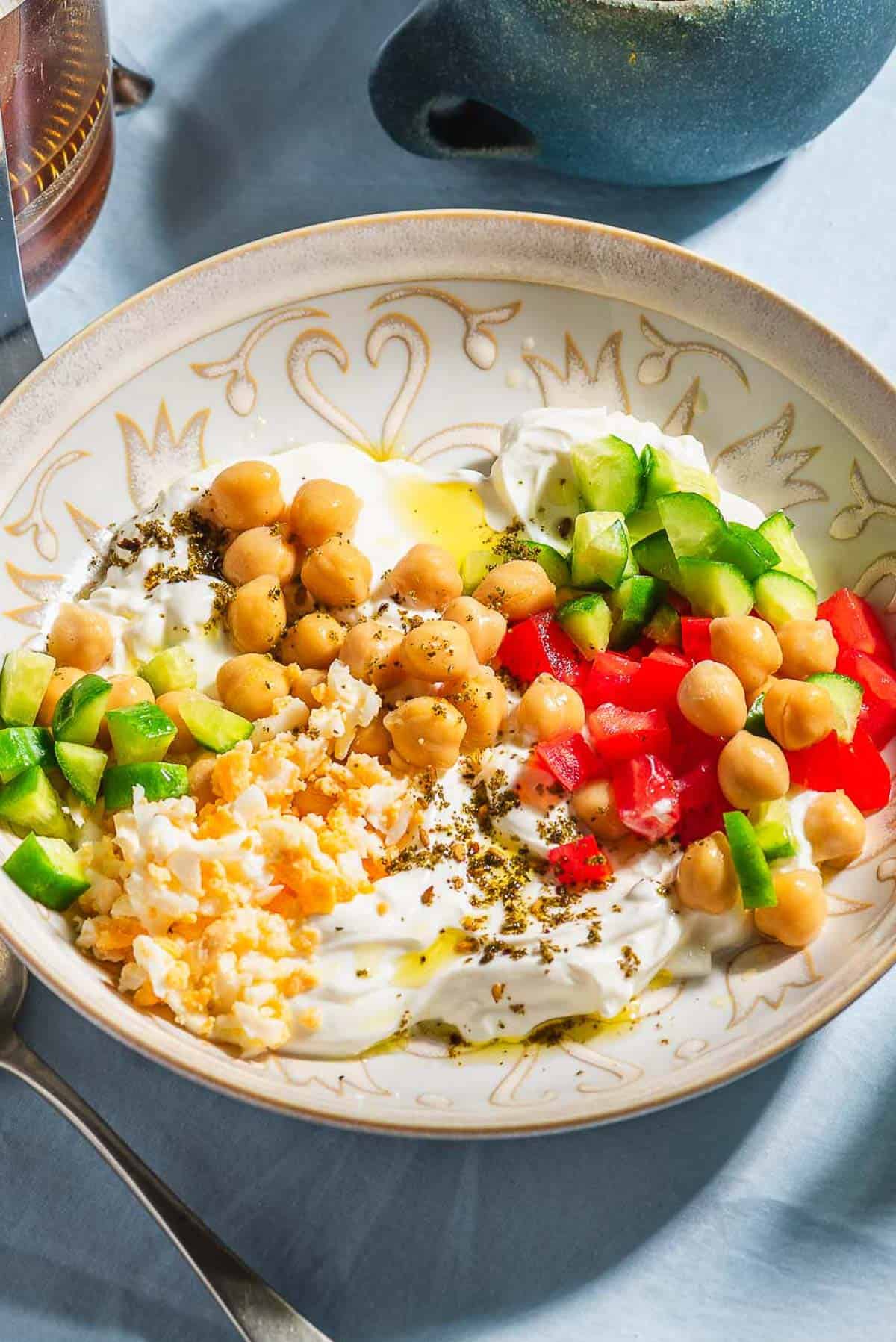 A close up of a savory yogurt bowl.