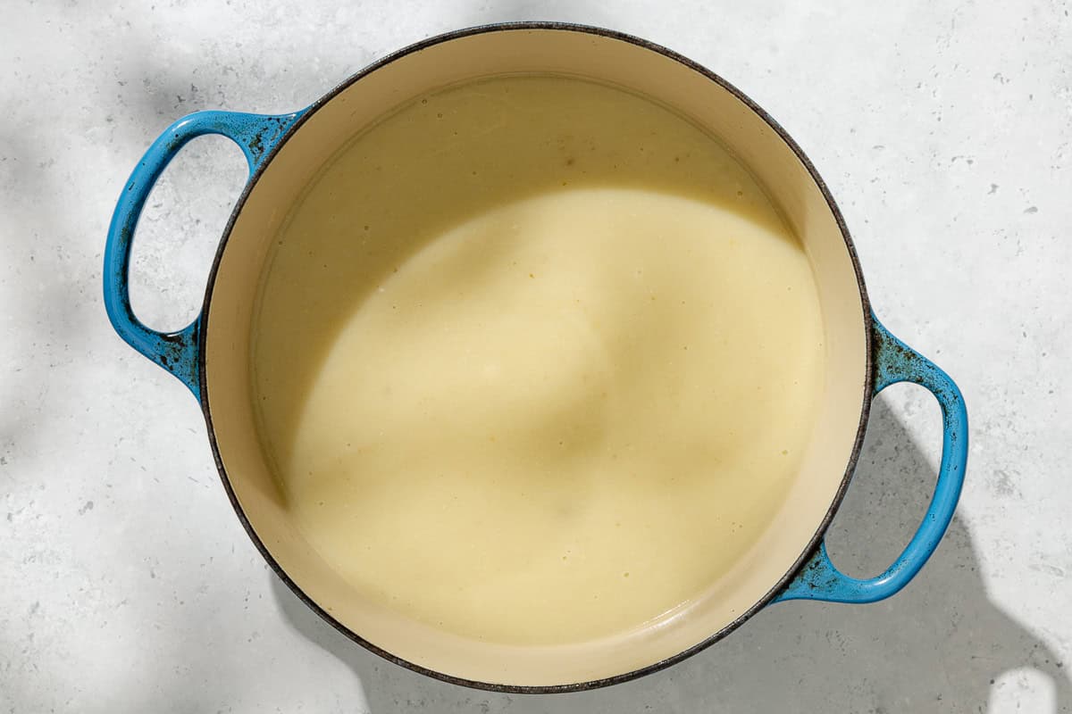 An overhead photo of the fennel soup in a pot, just after being pureed.