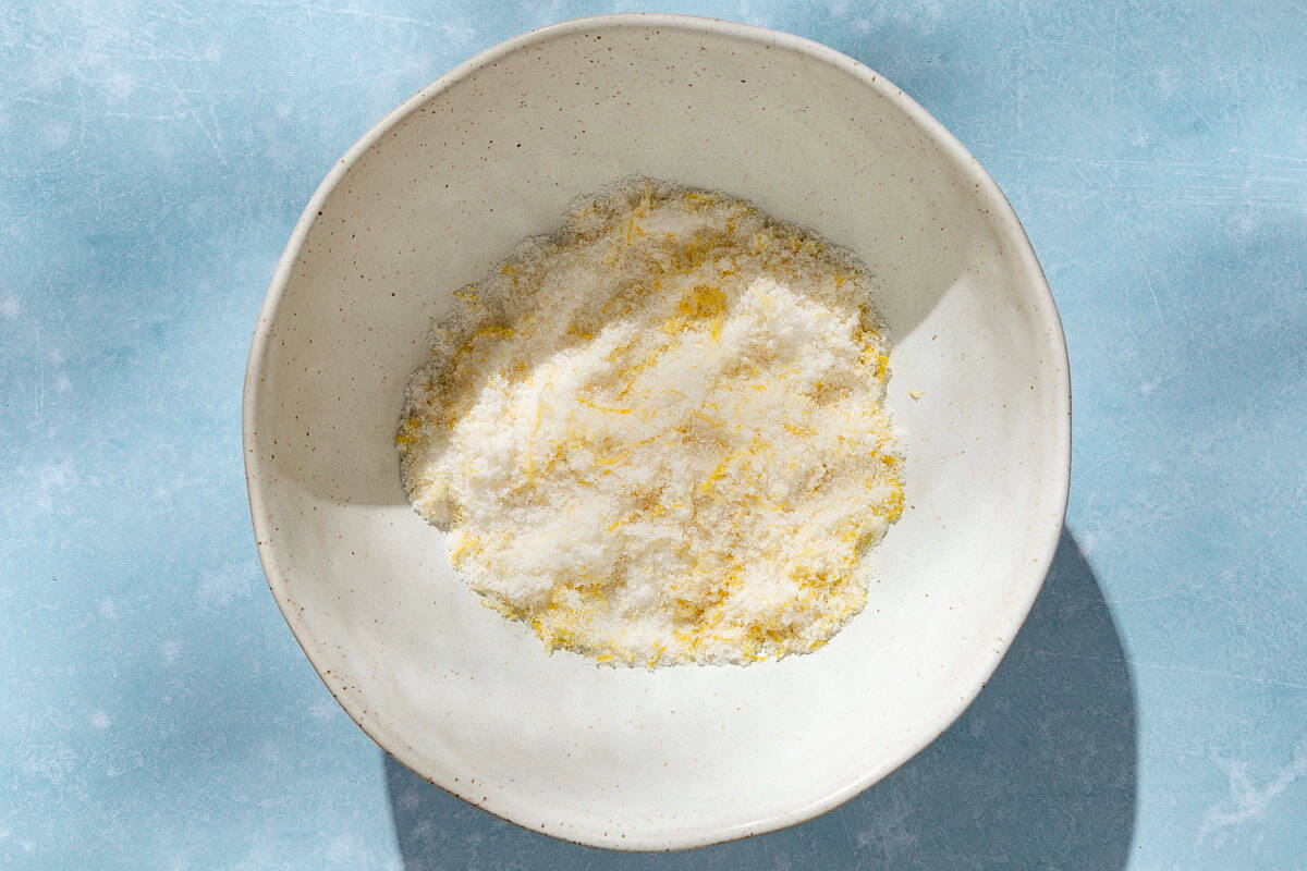 An overhead photo of the dry ingredients for the lemon tart in a mixing bowl.