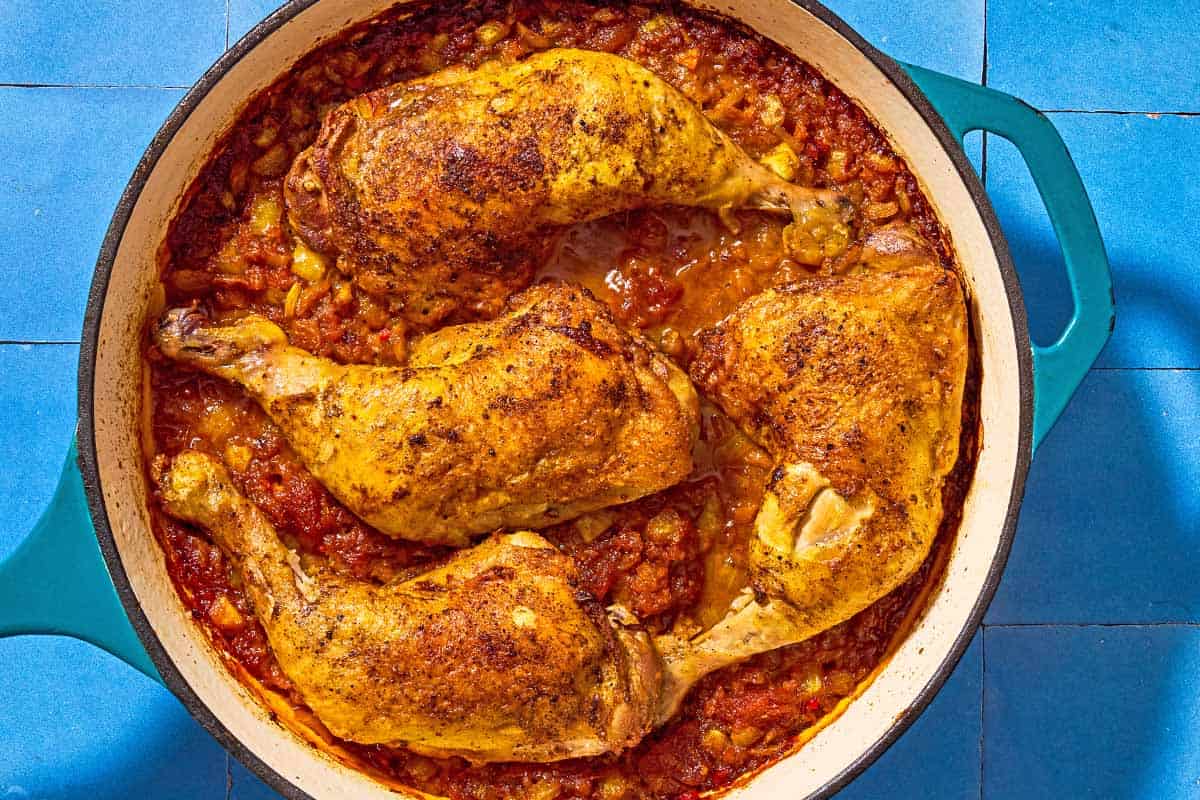 An overhead photo of apricot chicken and apricot sauce in a skillet.