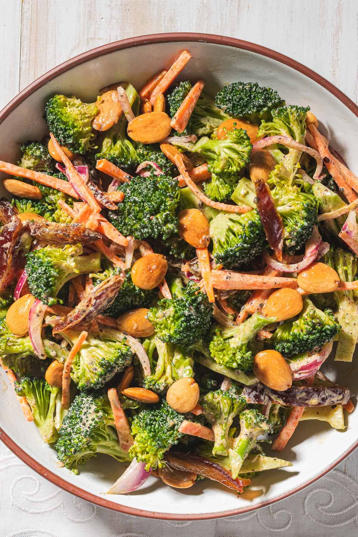 A close up of broccoli salad in a serving bowl.