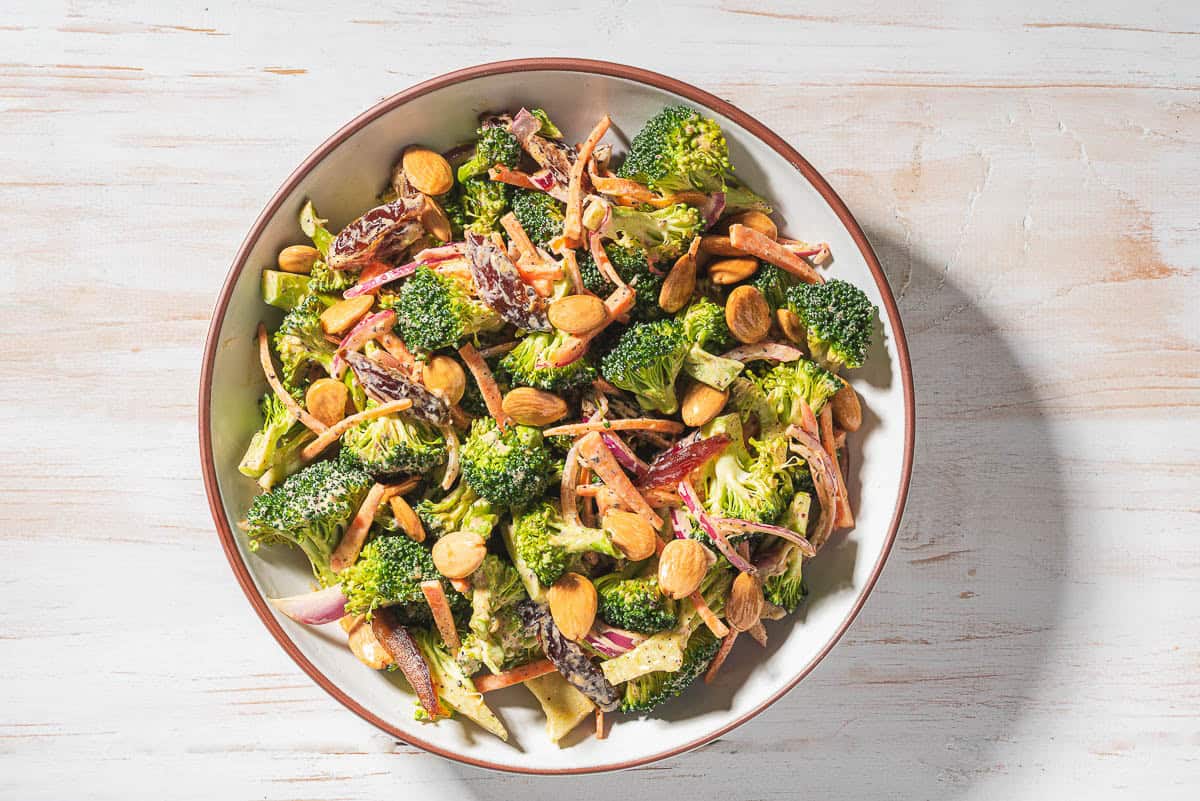 An overhead photo of broccoli salad in a serving bowl.