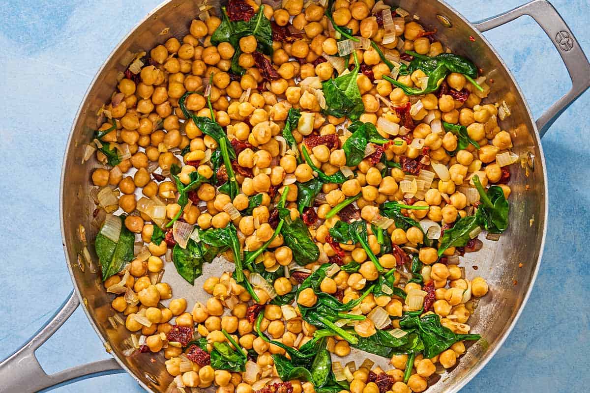 An overhead photo of the filled for the stuffed sweet potatoes in a skillet.