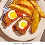 Greek Meatloaf with hardboiled eggs pin image 1.