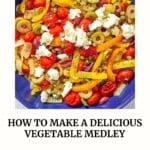 A blue skillet with a sauteed vegetables medley of sweet bell peppers, tomatoes, olives, and feta..